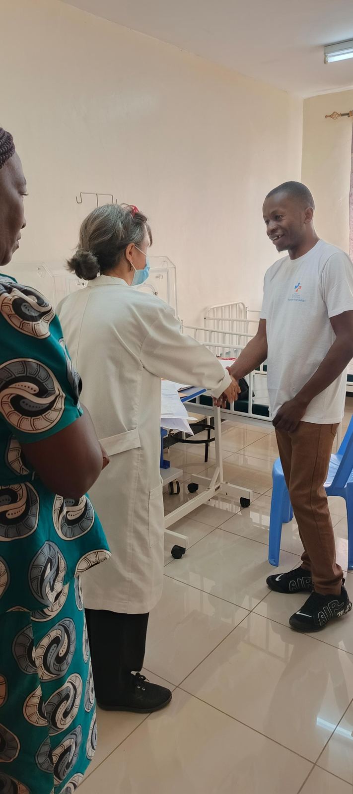 A member of the SR. Christenem Memorial Hospital team greeting a visitor
